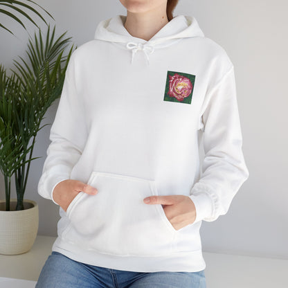 Person wearing a white hoodie with a small graphic on the chest, standing against a plain background.