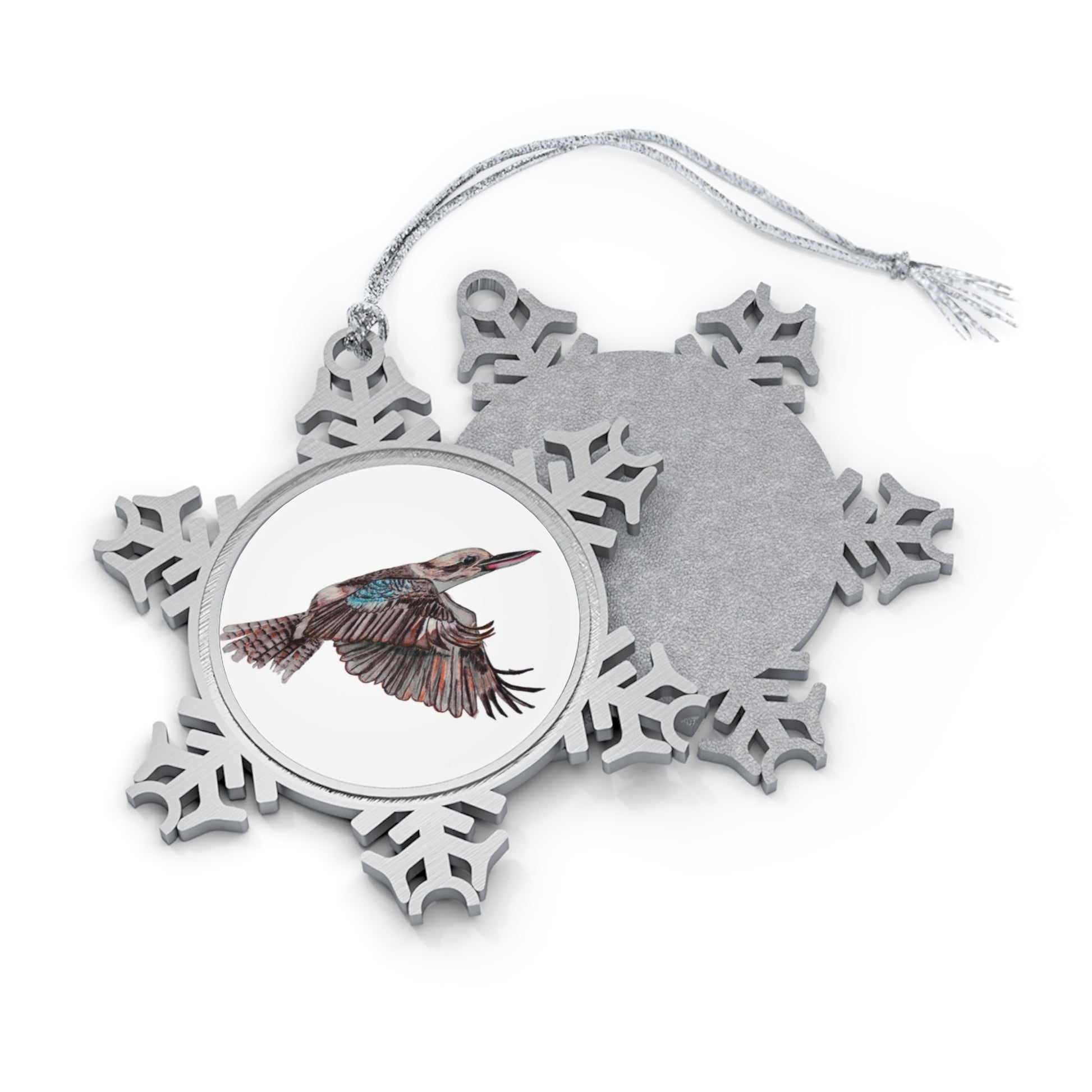 A pewter snowflake ornament with a unique design featuring an animal in the center, connected to a silver-toned hanging string.